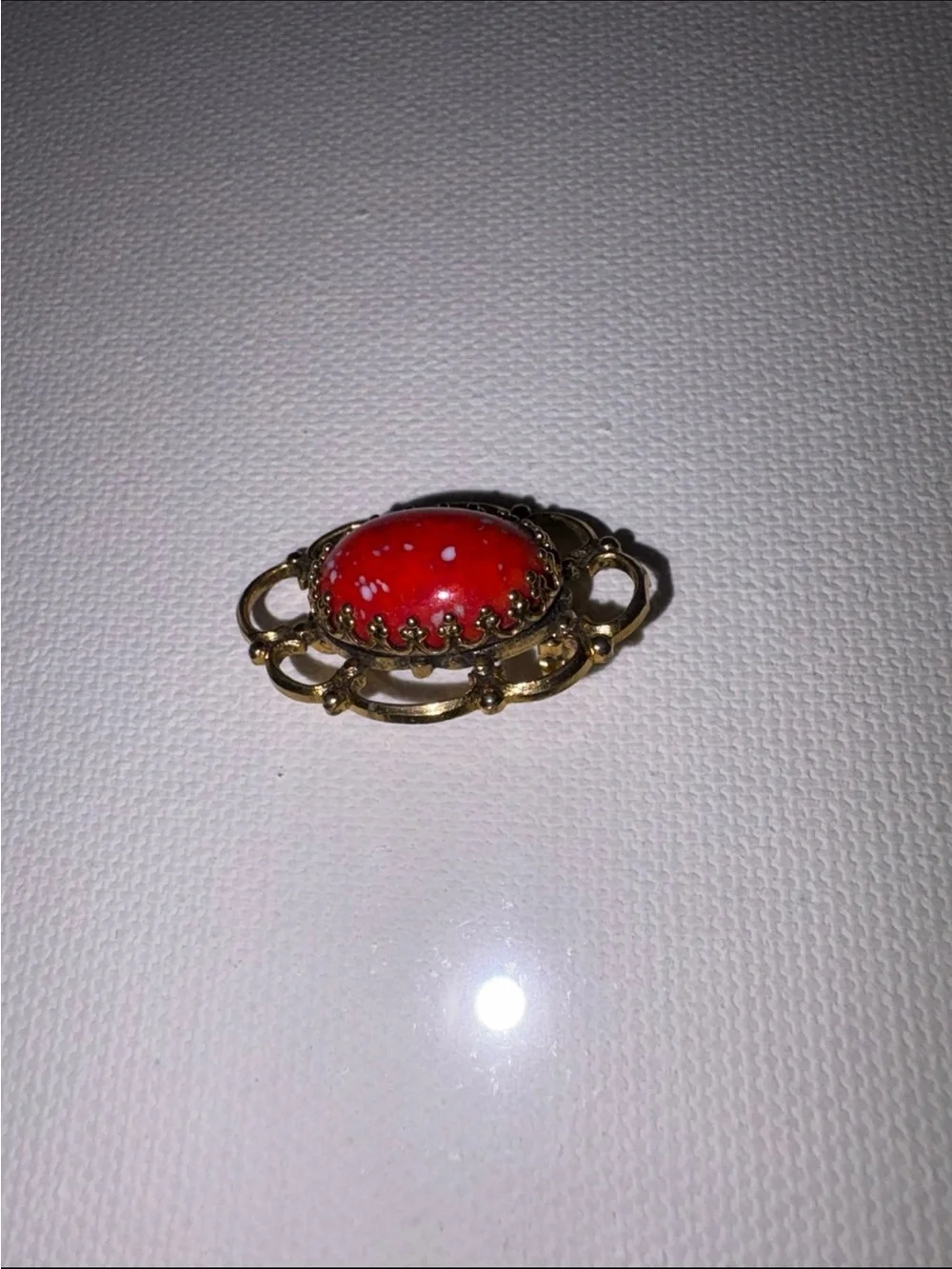 Vintage freirich gold tone orange speckled cabochon brooch
